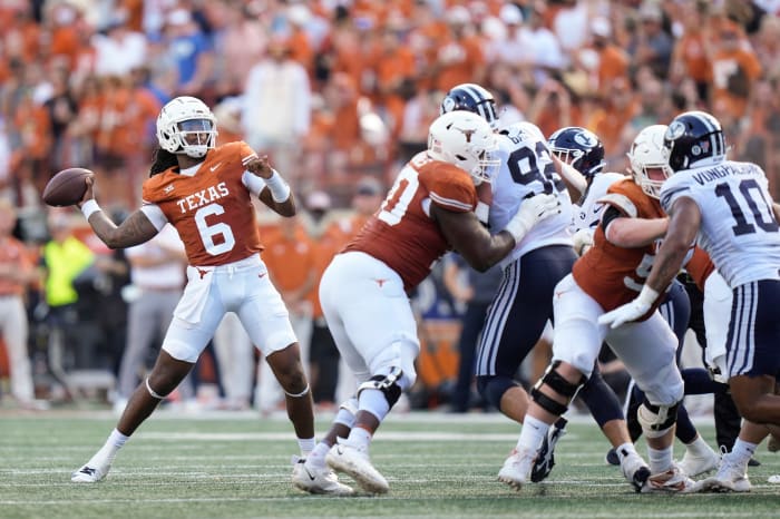 Texas Longhorns quarterback Maalik Murphy throws a touchdown pass to wide receiver Adonai Mitchell in the second quarter against the BYU Cougars at Royal-Memorial Stadium on Saturday October 28, 2023